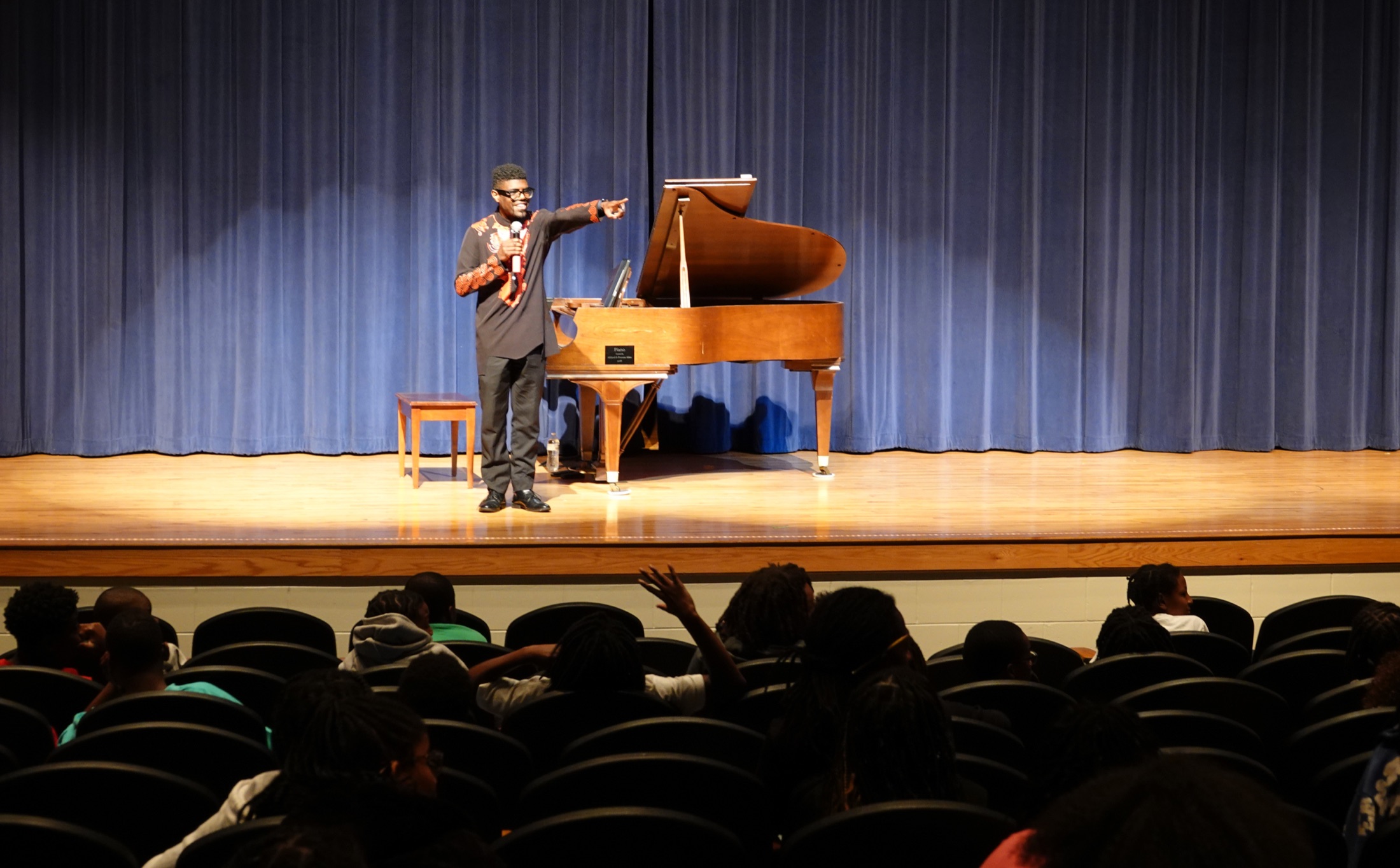 Kyle P. Walker performing Bach to Black Notes for the Boys & Girls of Summer Camp in Brunswick, Georgia